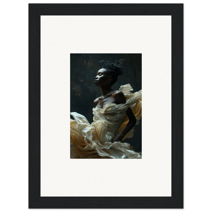 Framed portrait photograph of a person wearing flowing white fabric against a dark background.