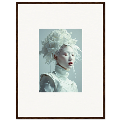 Framed wall art of a florid creature in white makeup with a feathered headdress