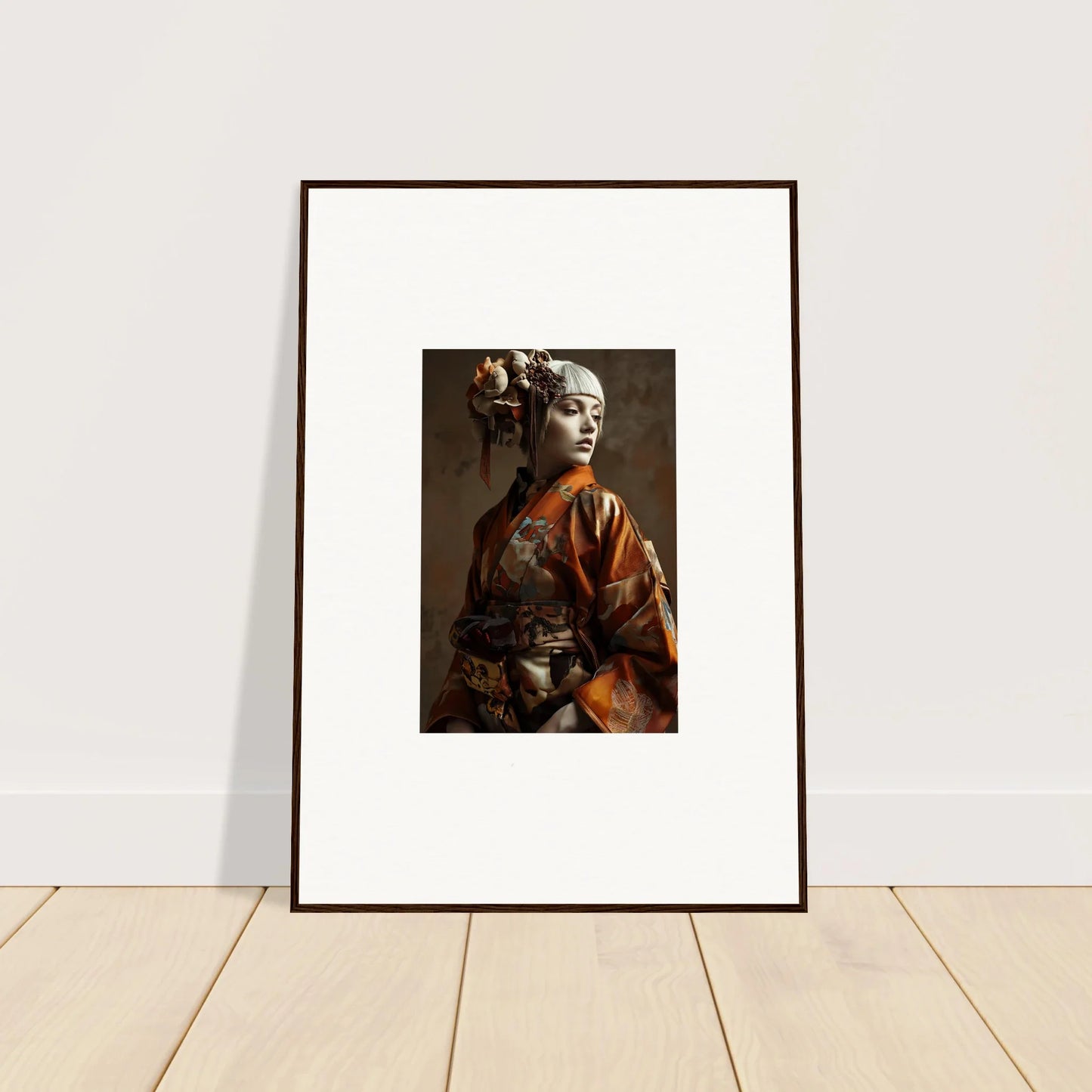 Framed wall art of a person in traditional Japanese attire and hairstyle, shadows whispering