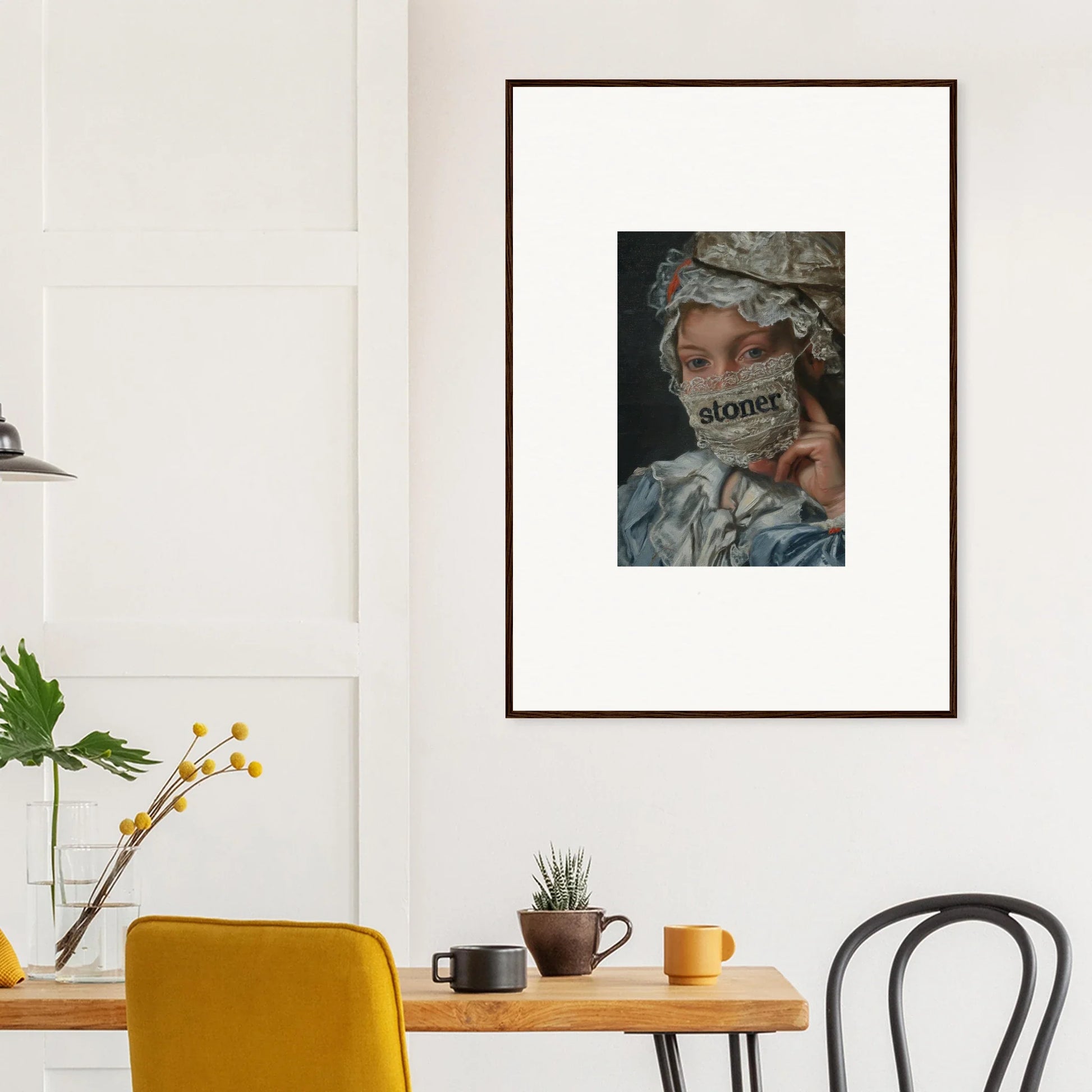 Framed wall art of a person with partially covered face in Metamorphose Bliss decor