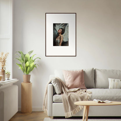 Framed wall art of a person in an expressive pose, showcasing feathered elegance