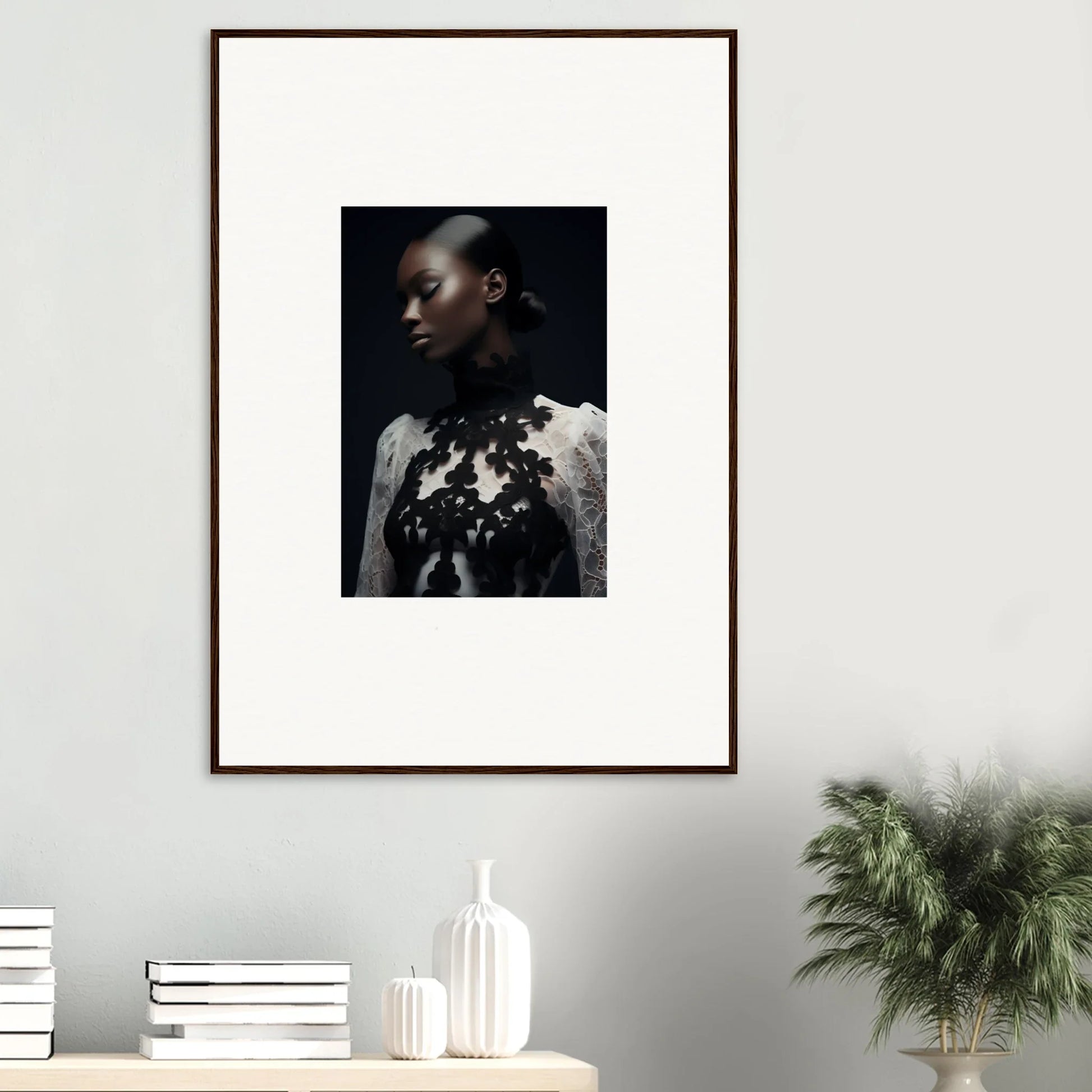 Framed wall art portrait of a person in a white top with floral embellishments