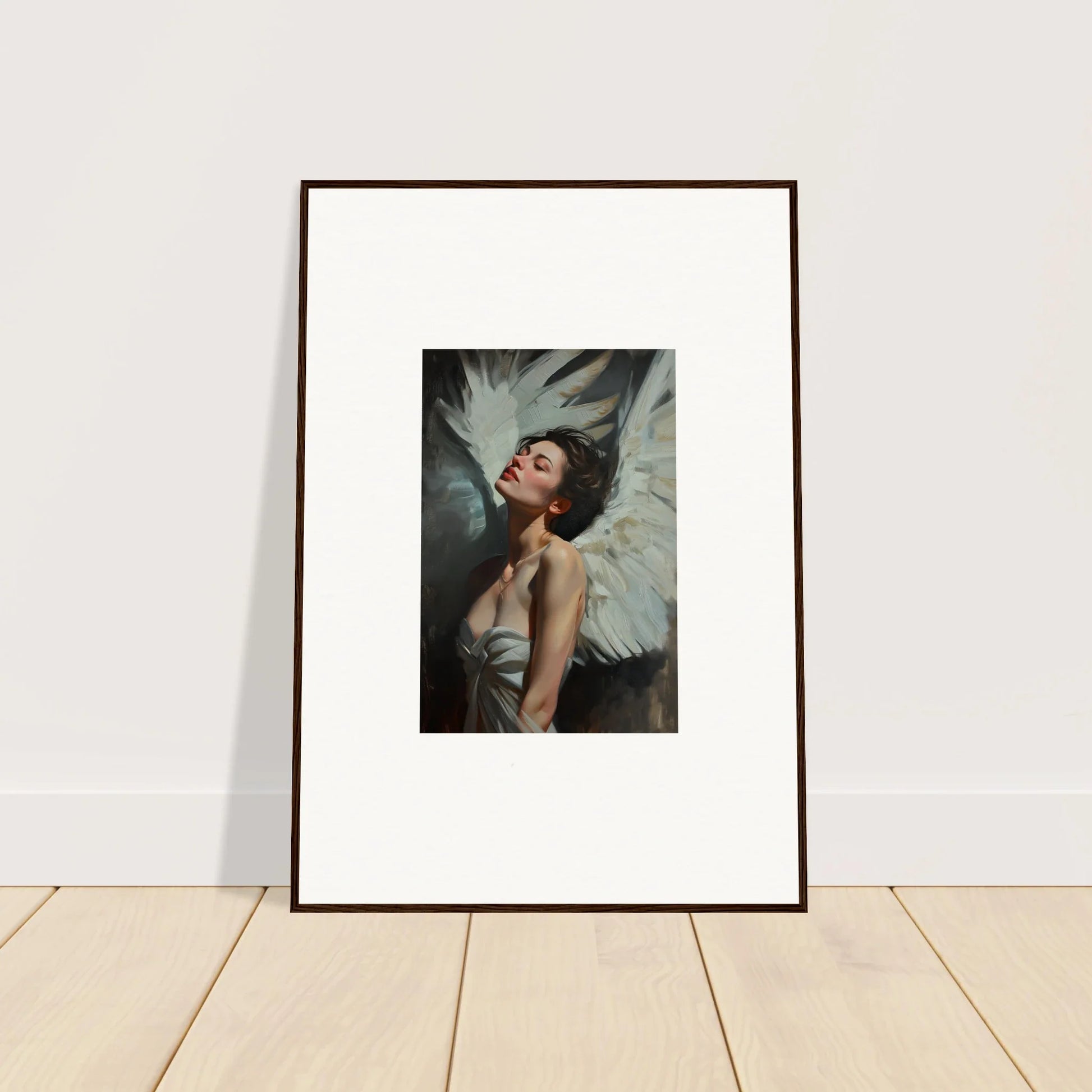 Framed wall art of a woman with white angel wings showcasing feathered elegance