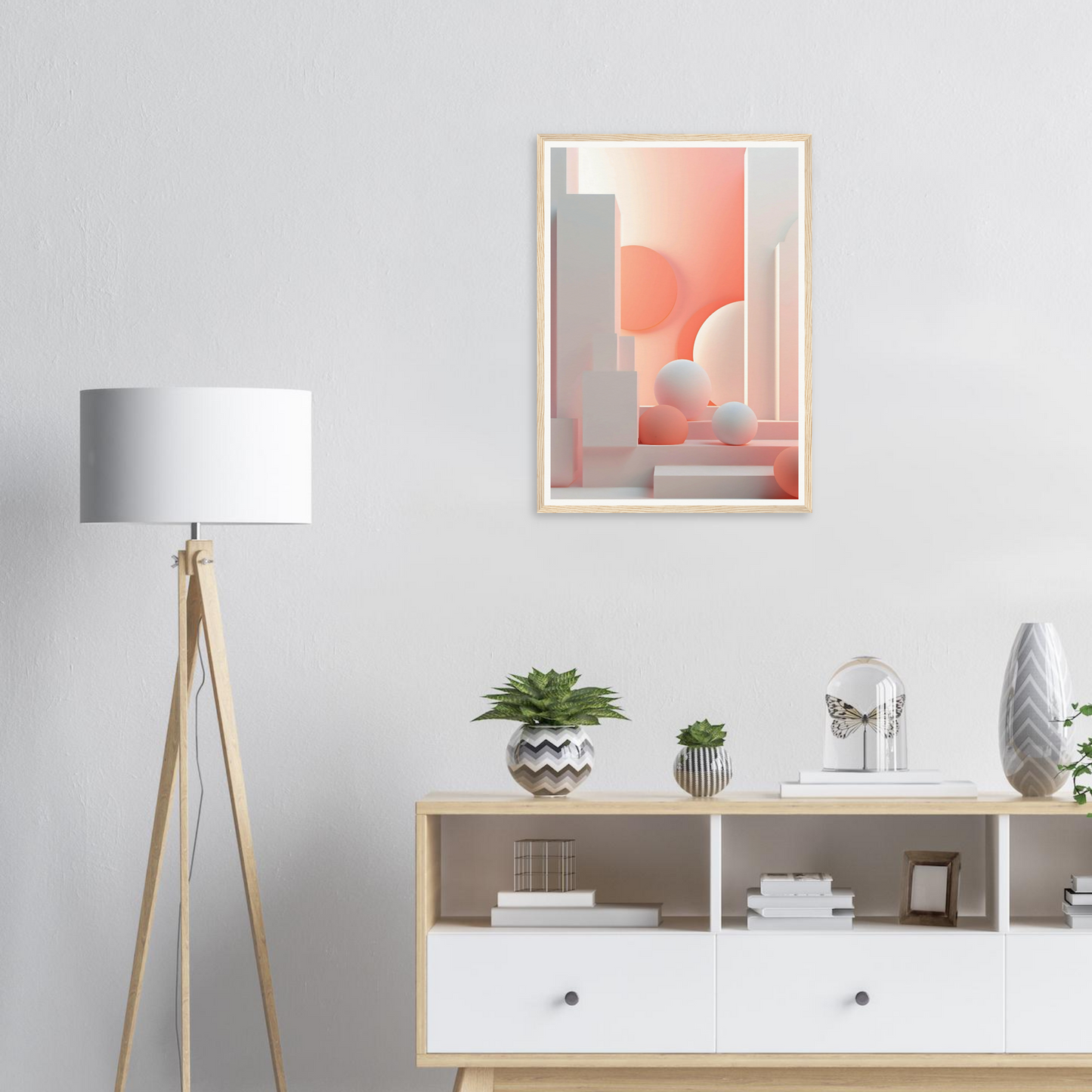 A framed print on a wall above a white dresser