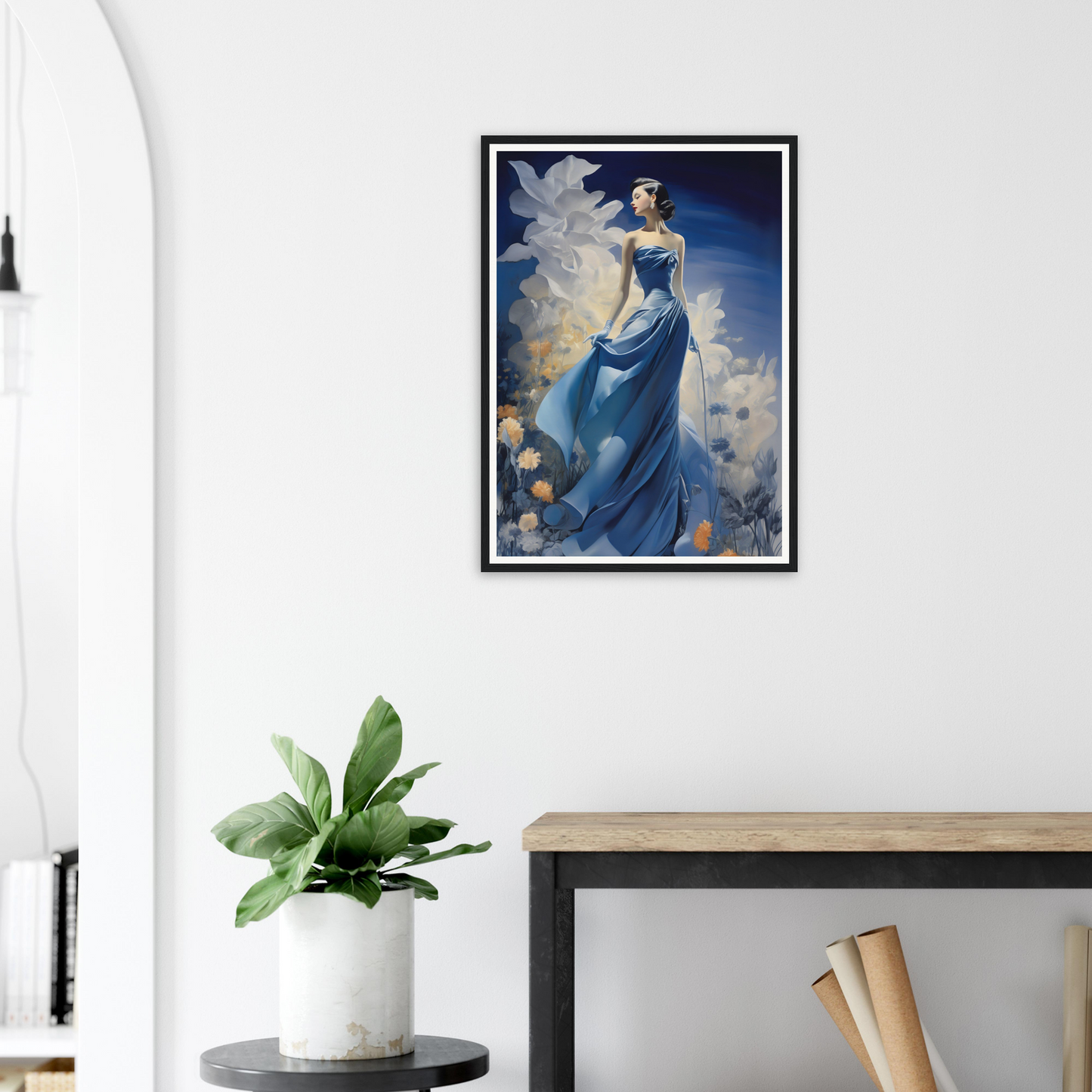 A framed print of a woman in a blue dress with a white dove in her hand