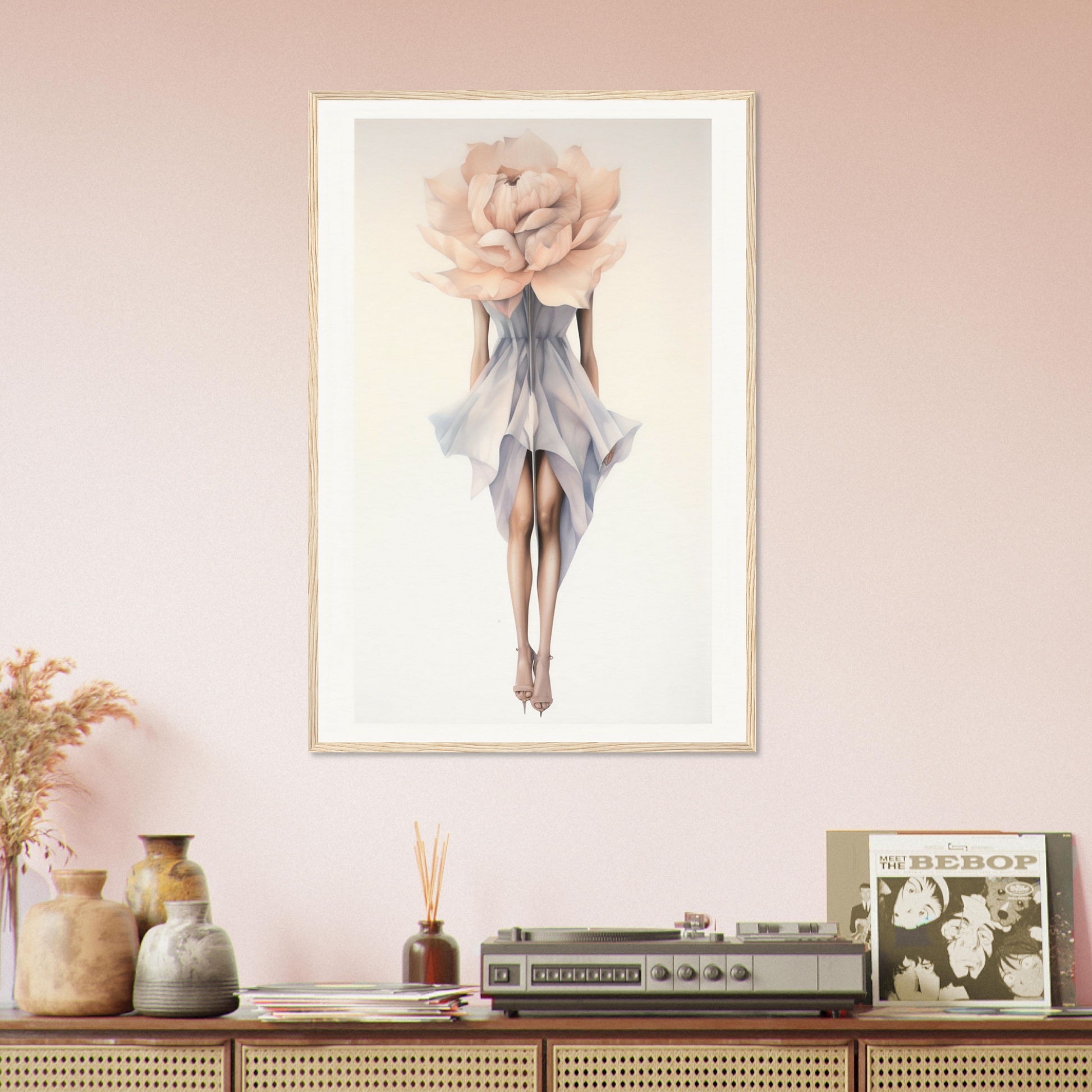 A framed print of a woman in a blue dress with a flower on the wall