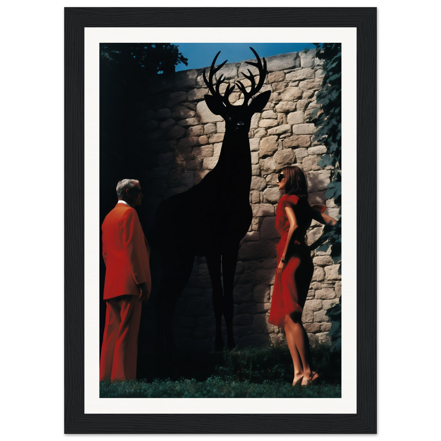 A framed print of a woman and a deer