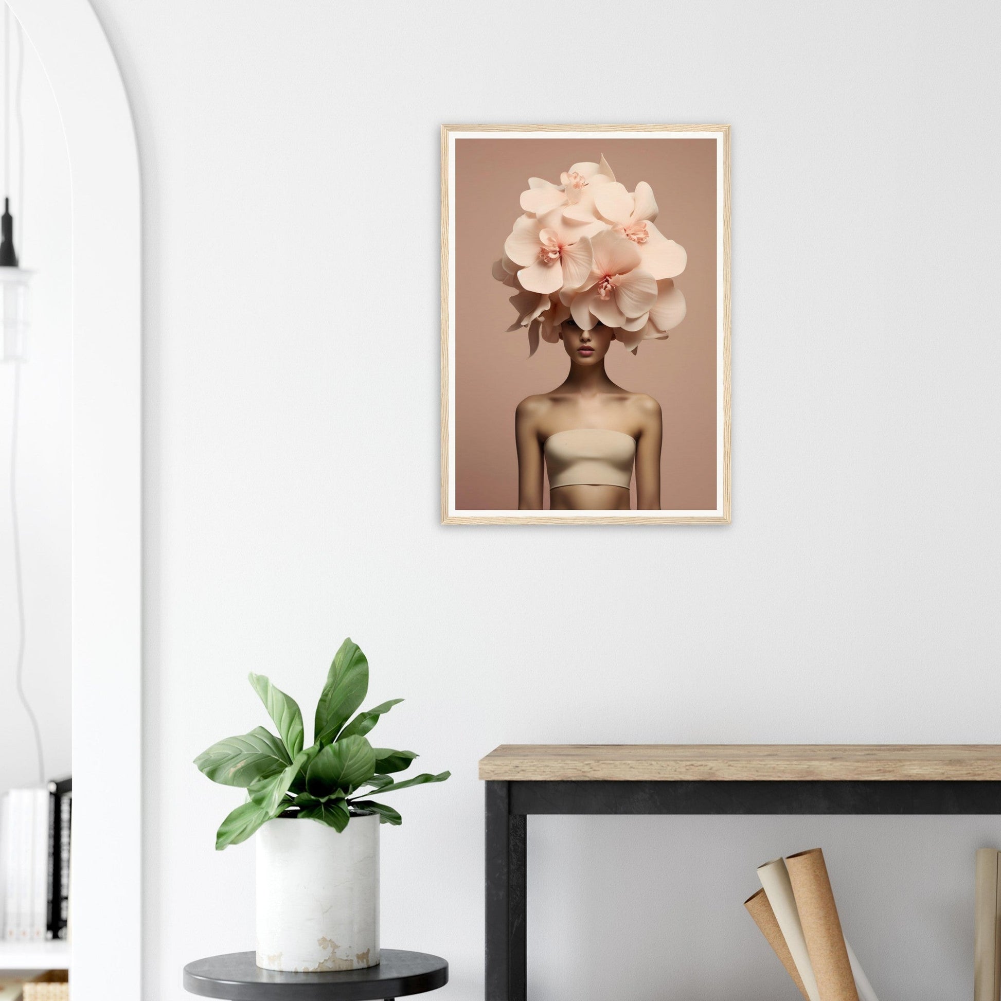 A framed print of a woman with a flower in her hair