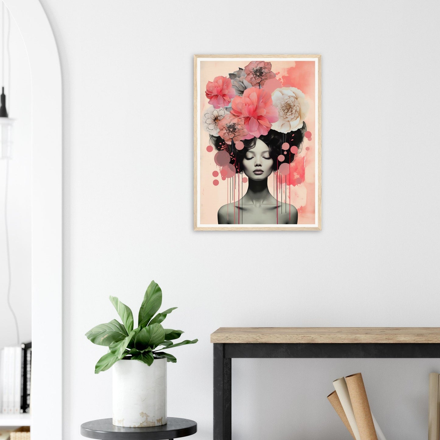 A framed print of a woman with flowers in her hair