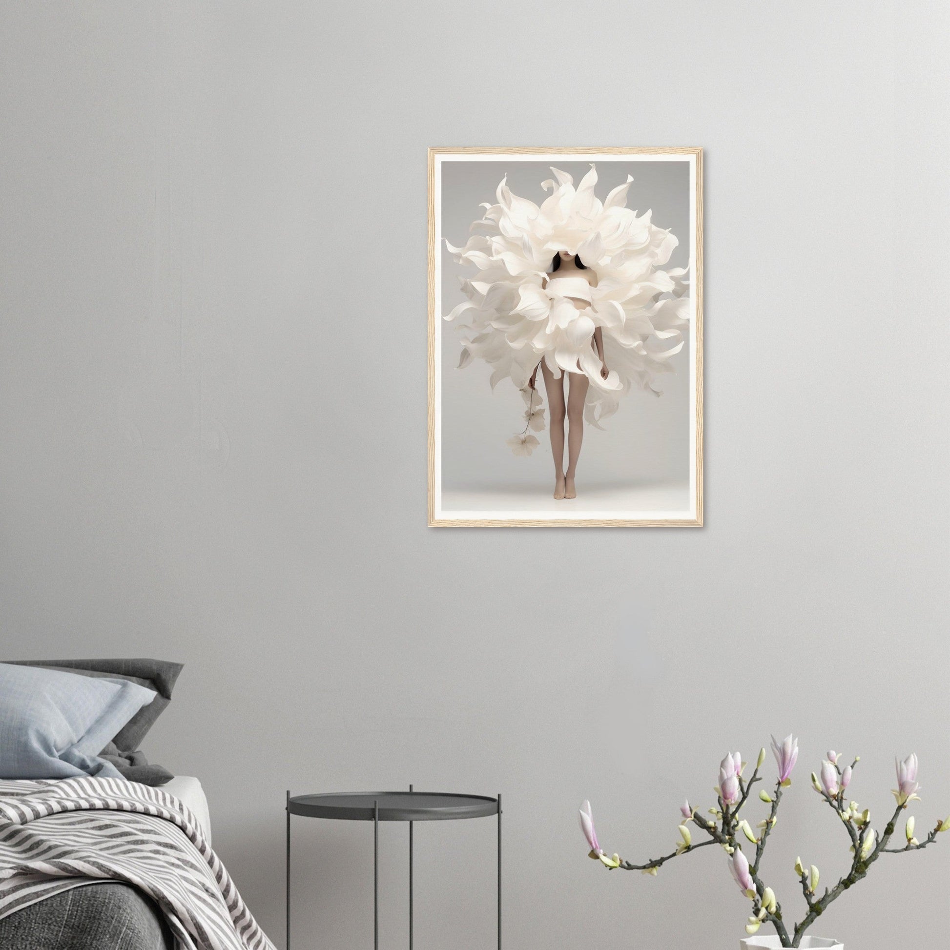 A framed print of a woman in white dress with large white flowers