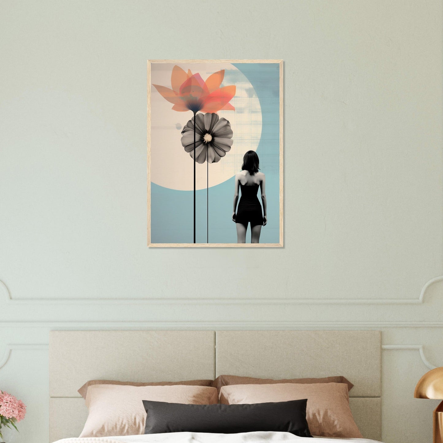 Framed artwork depicting a silhouetted figure standing before stylized flower shapes against a blue and white background.