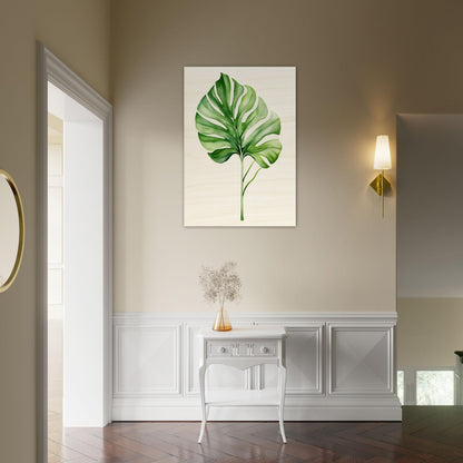 A green leaf on a beige background in a room