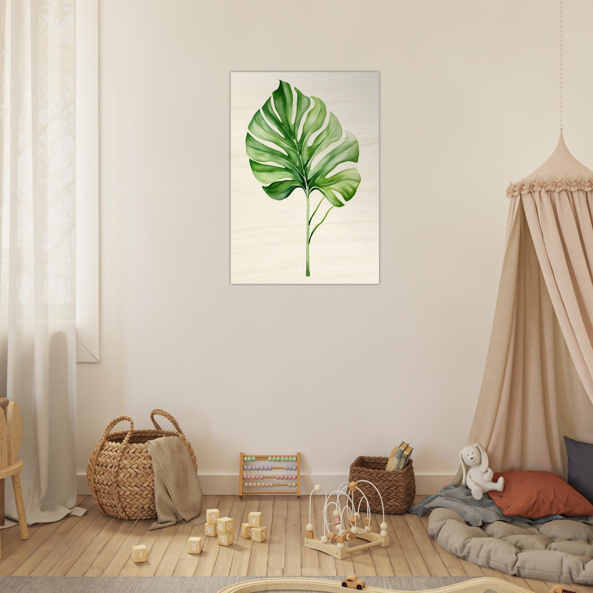 A green leaf on a white background in a child’s room