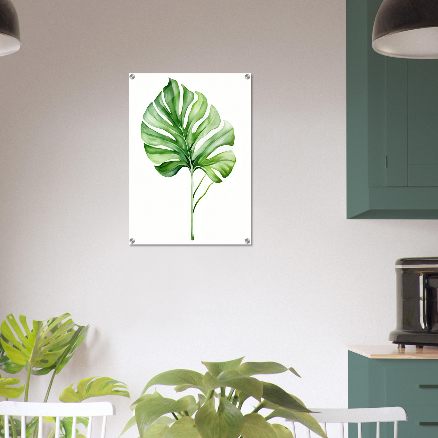 A green leaf on a white background