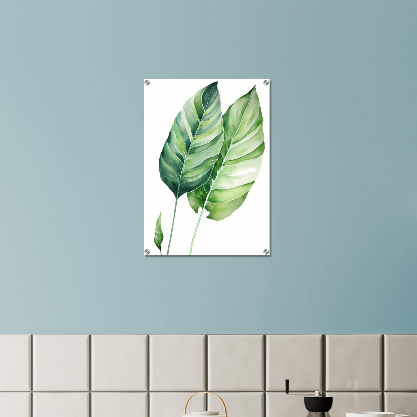 A green leaf on a white background