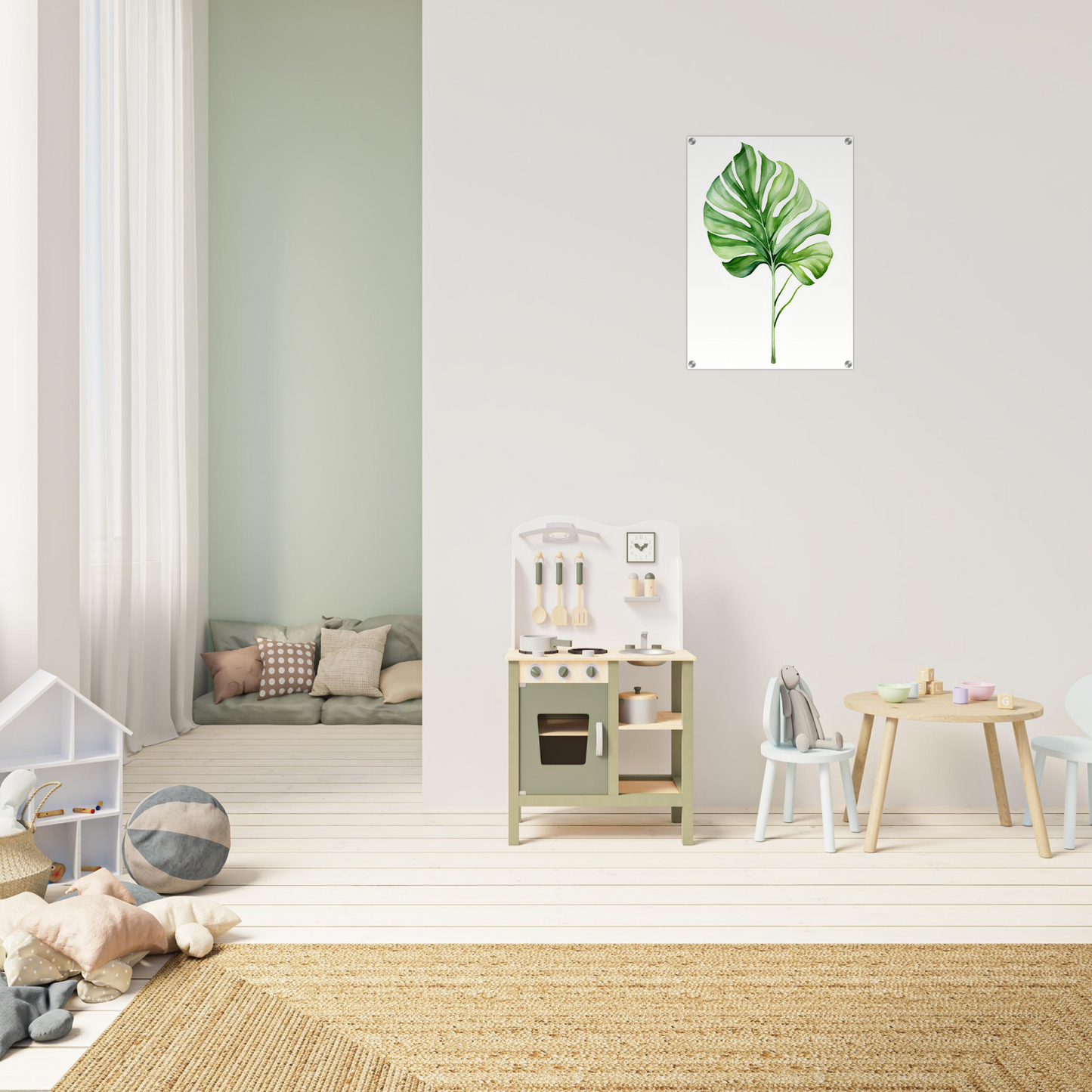 A green leaf on a white background in a child’s room