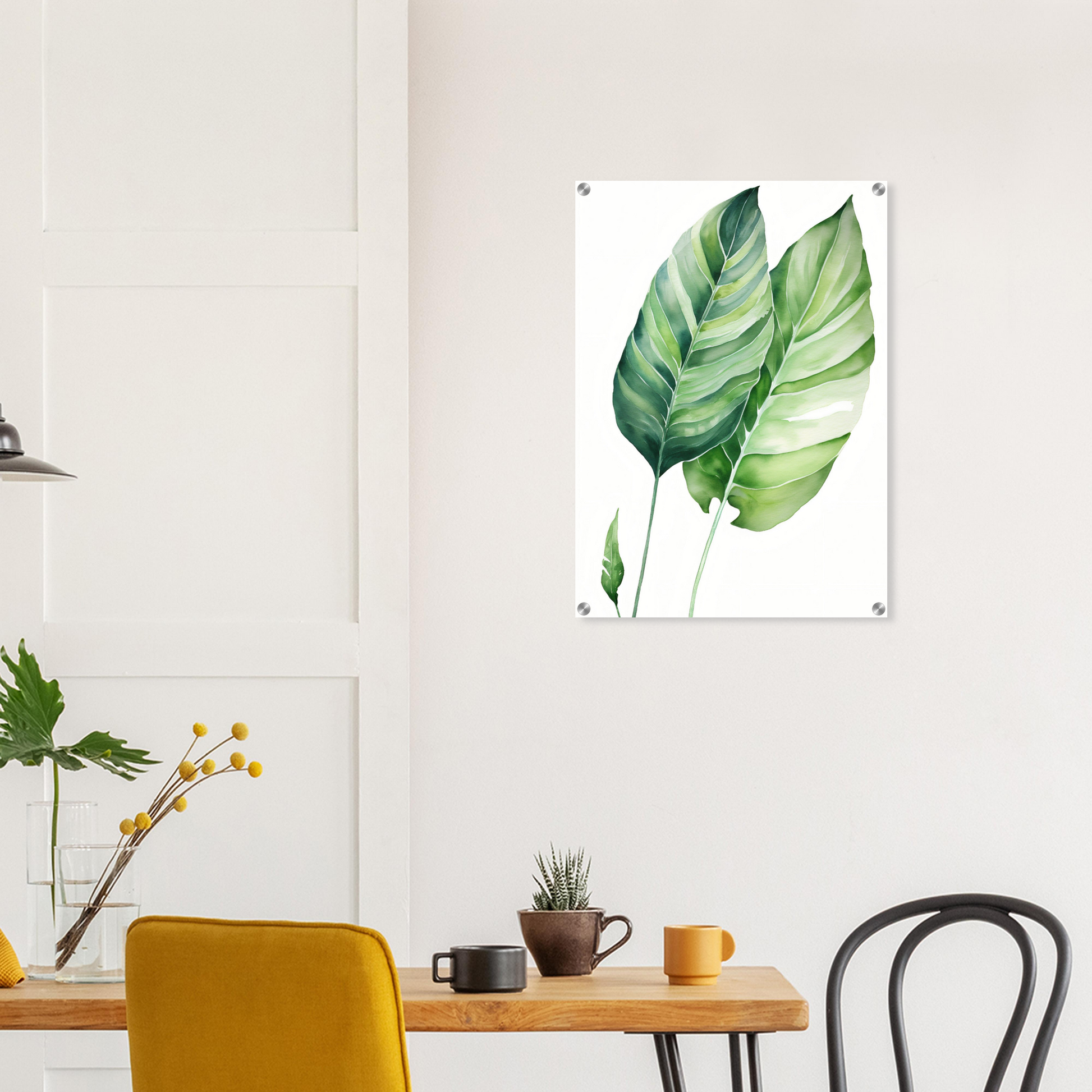 A green leaf on a white background