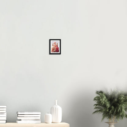 Framed portrait photograph with a reddish-pink tint hanging on a wall.