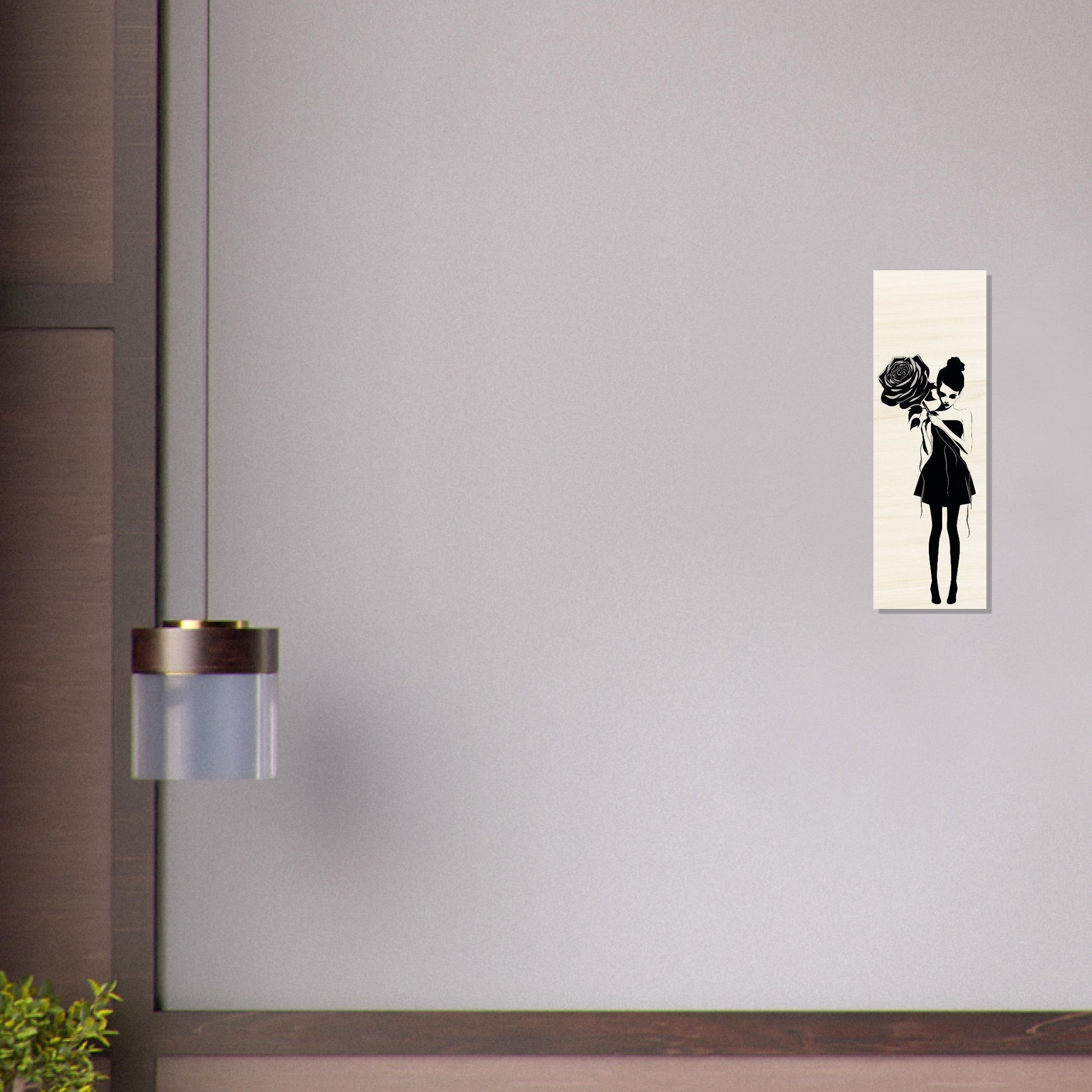 Silhouette artwork of a girl with a flower-shaped head on a white canvas.