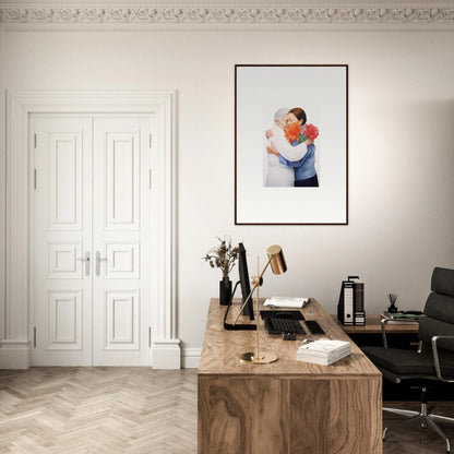 Home office workspace featuring wooden desk, chair, and framed wall art decor