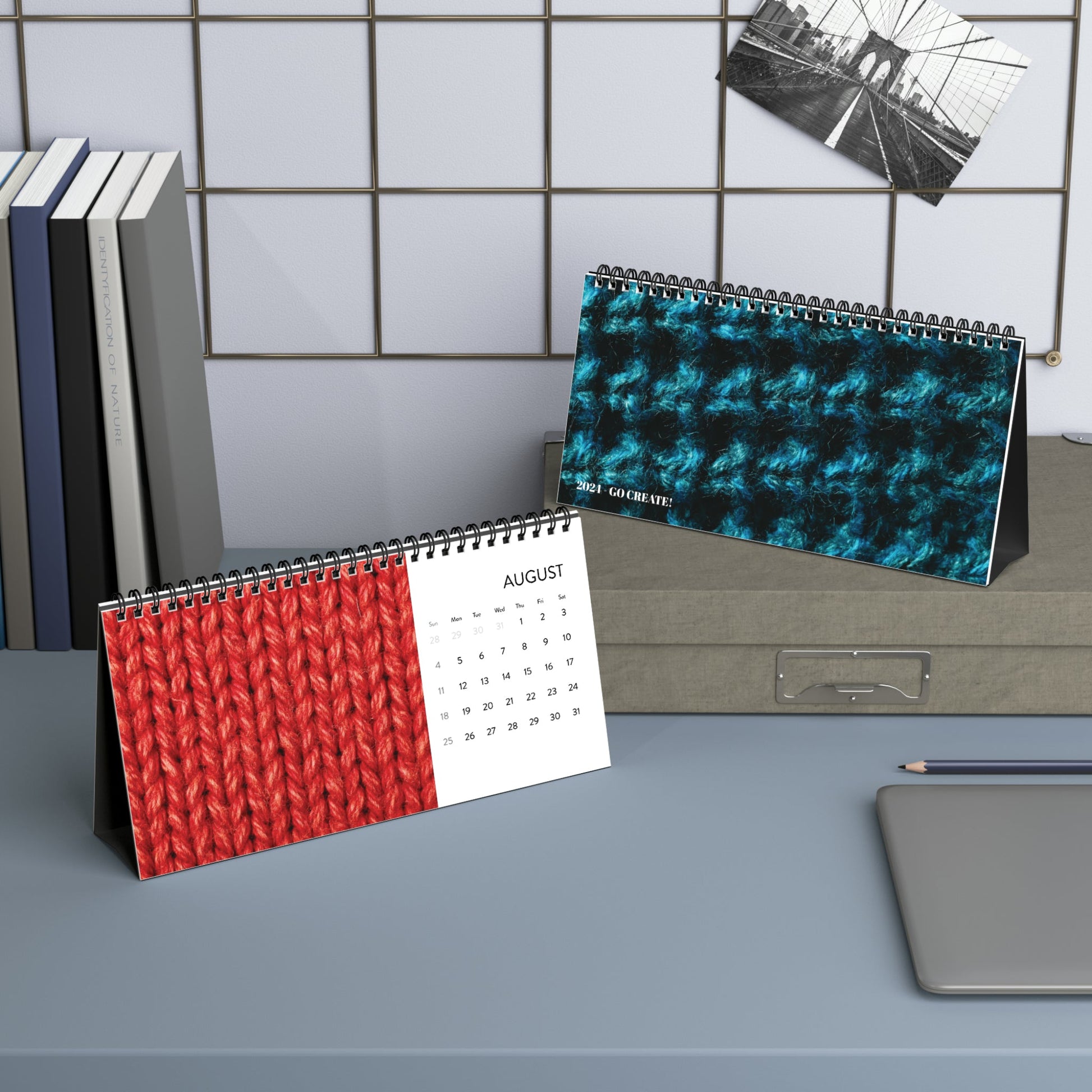 A Crochet Addicts - 2024 Desktop Calendar on top of a desk.