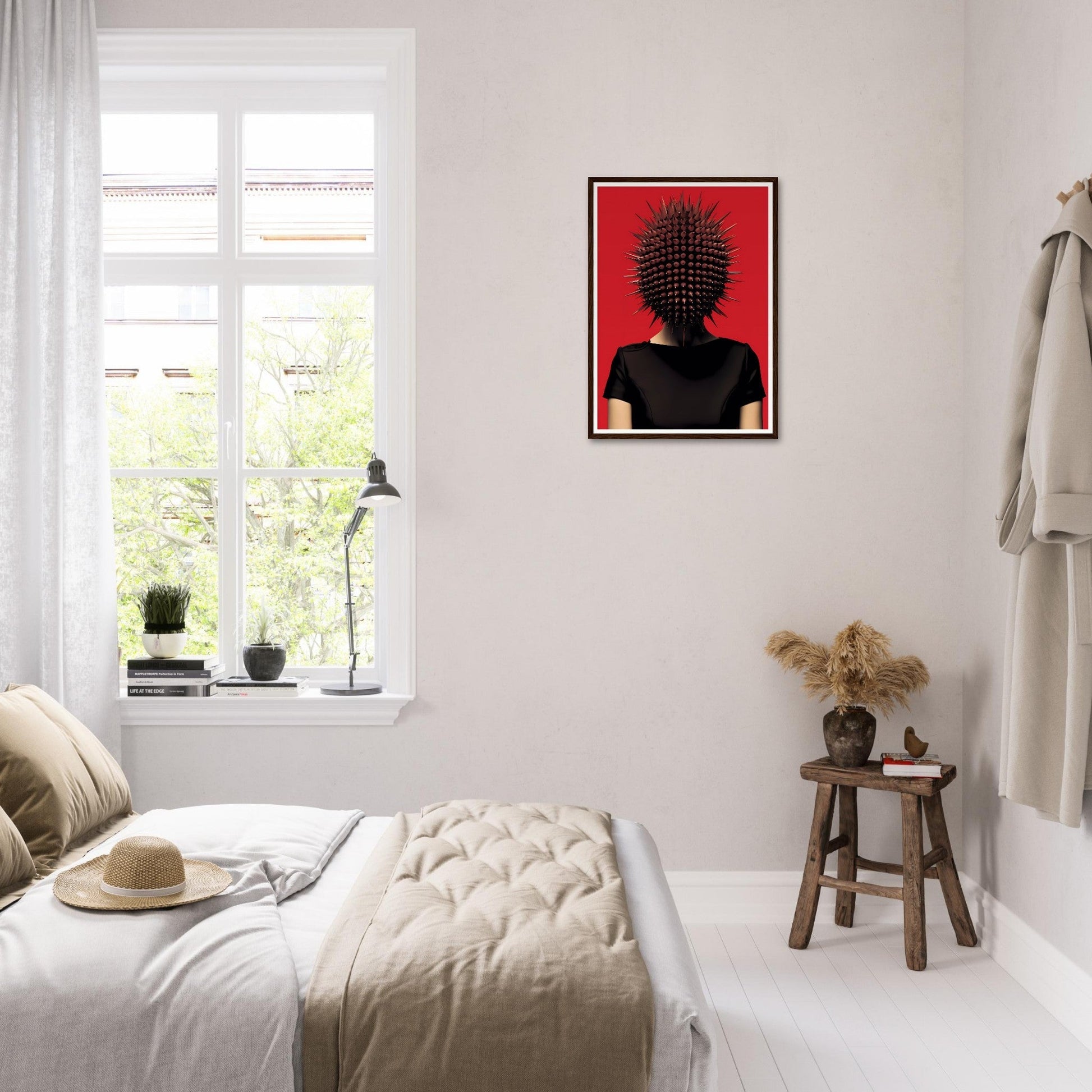 Bright, airy bedroom with minimalist decor and a striking red artwork on the wall.