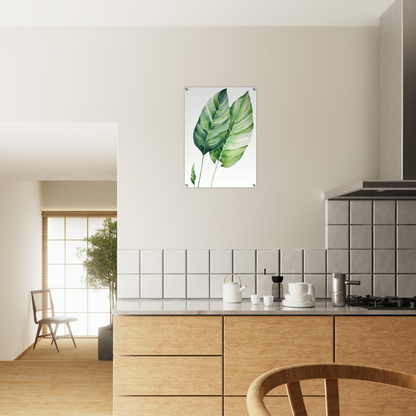 A kitchen with a wooden counter and a large green leaf on the wall