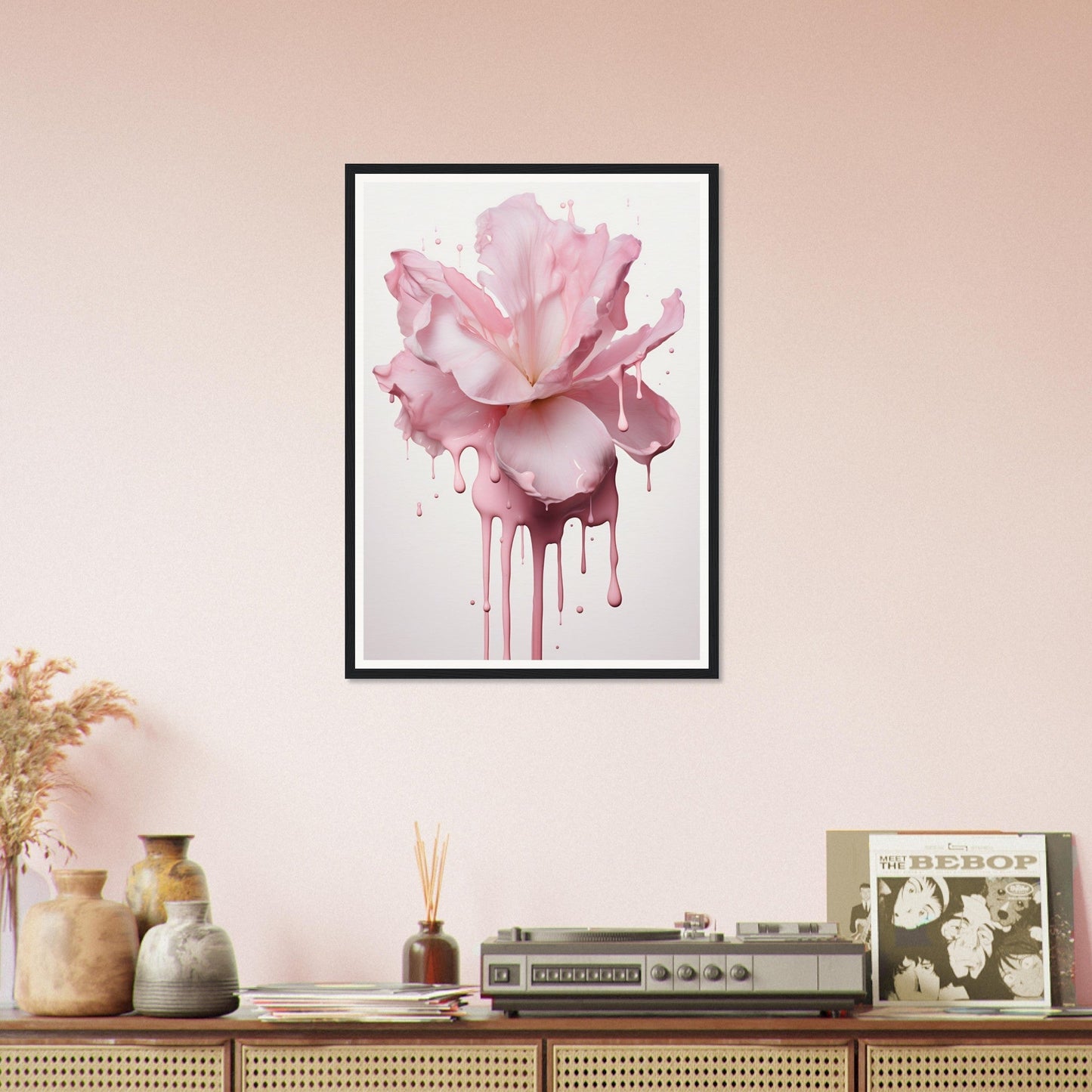 Framed artwork of a pink rose with dripping paint effect.