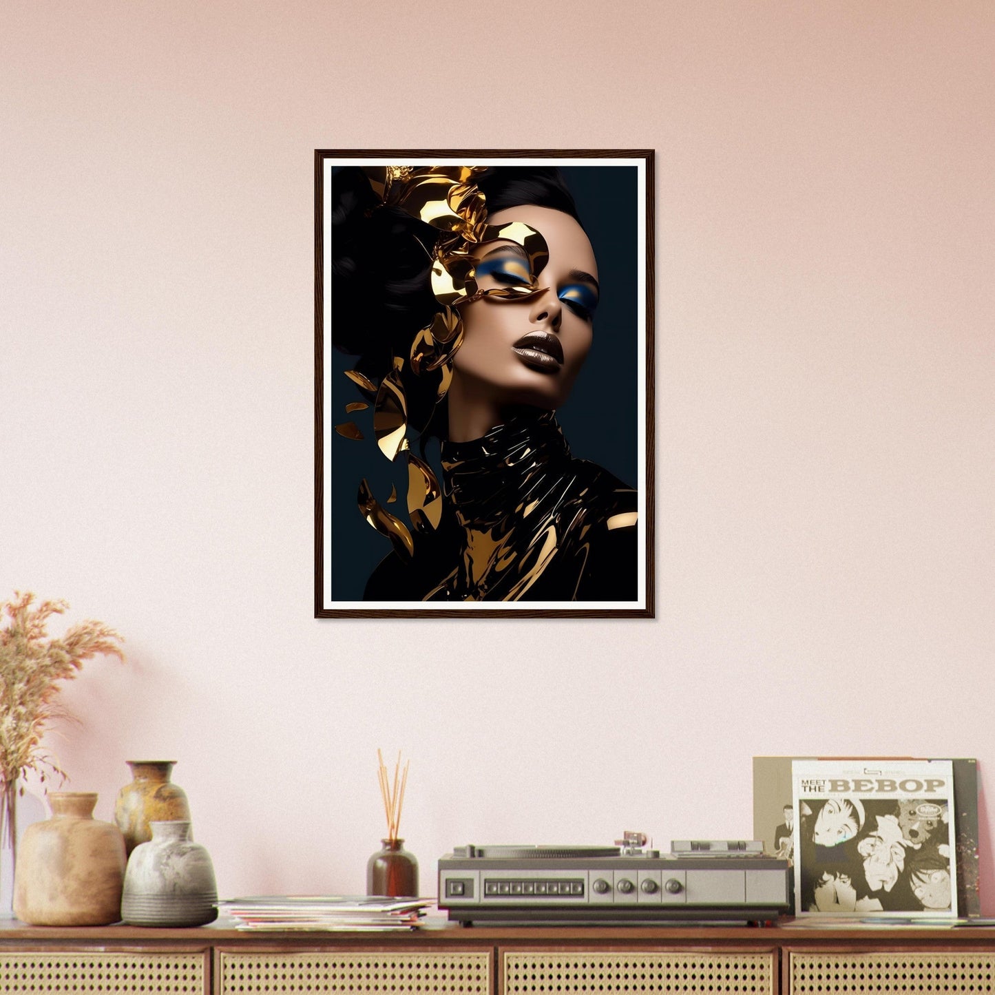 Framed portrait of a person with gold leaf accents and dramatic makeup.