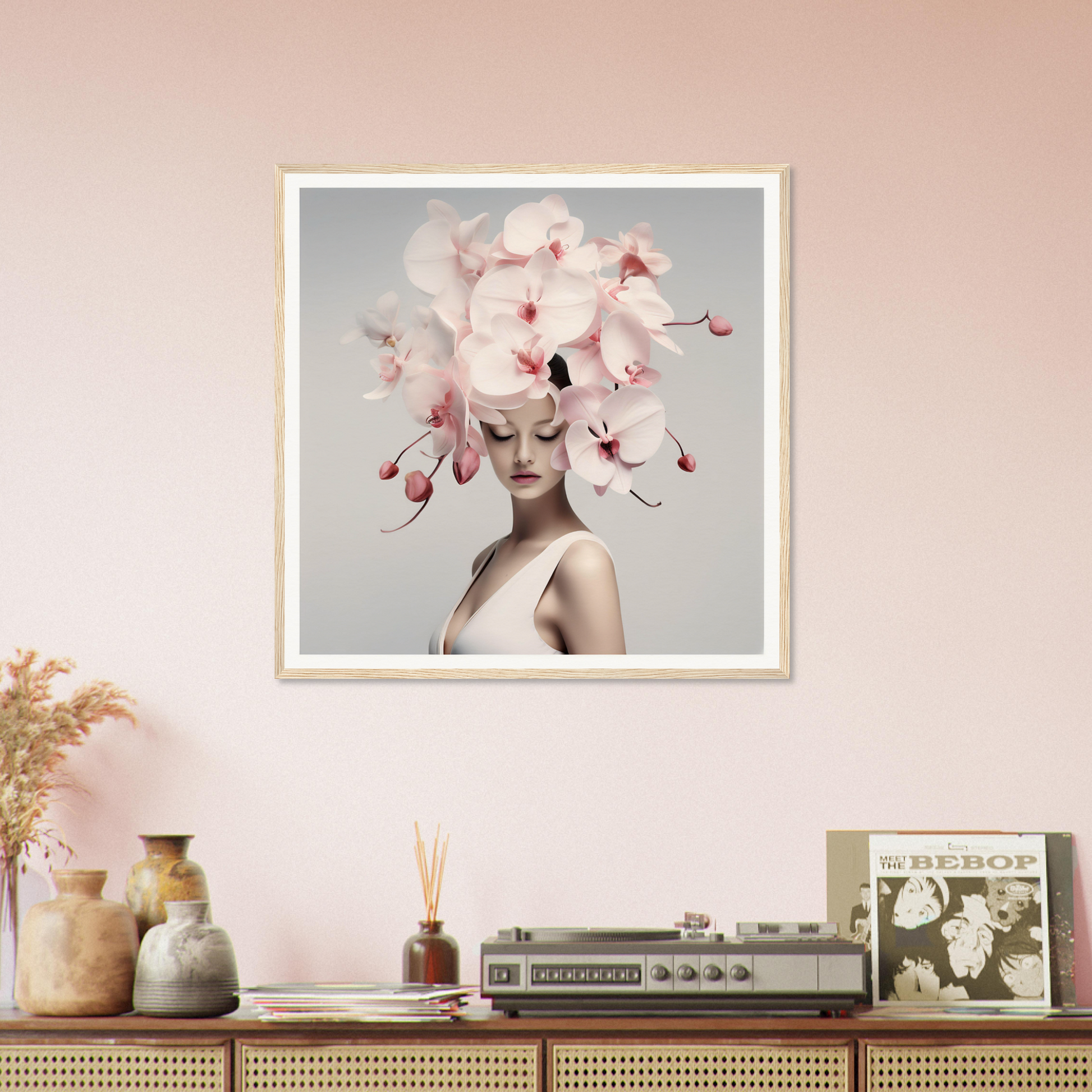 Framed artwork featuring a person wearing an elaborate floral headdress.