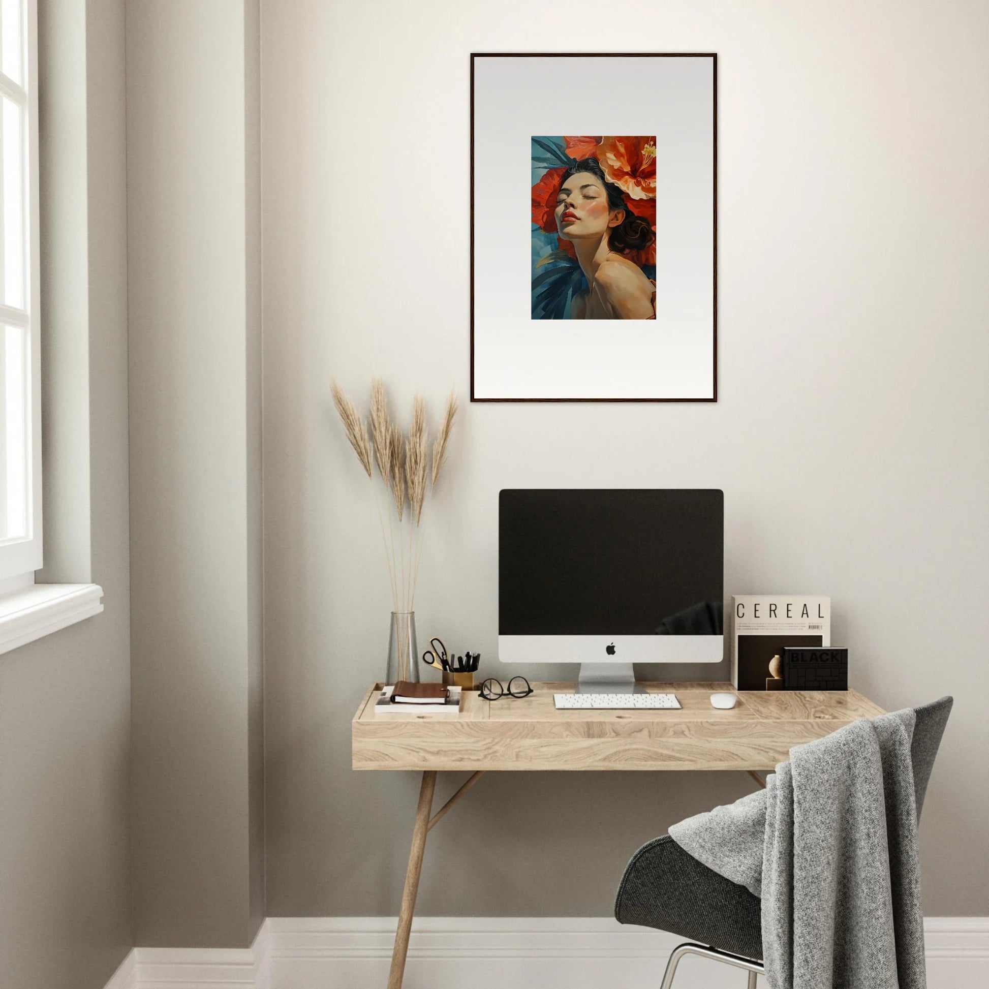 Minimalist home office workspace with wooden desk, computer, and Petal Palpitation framed wall art