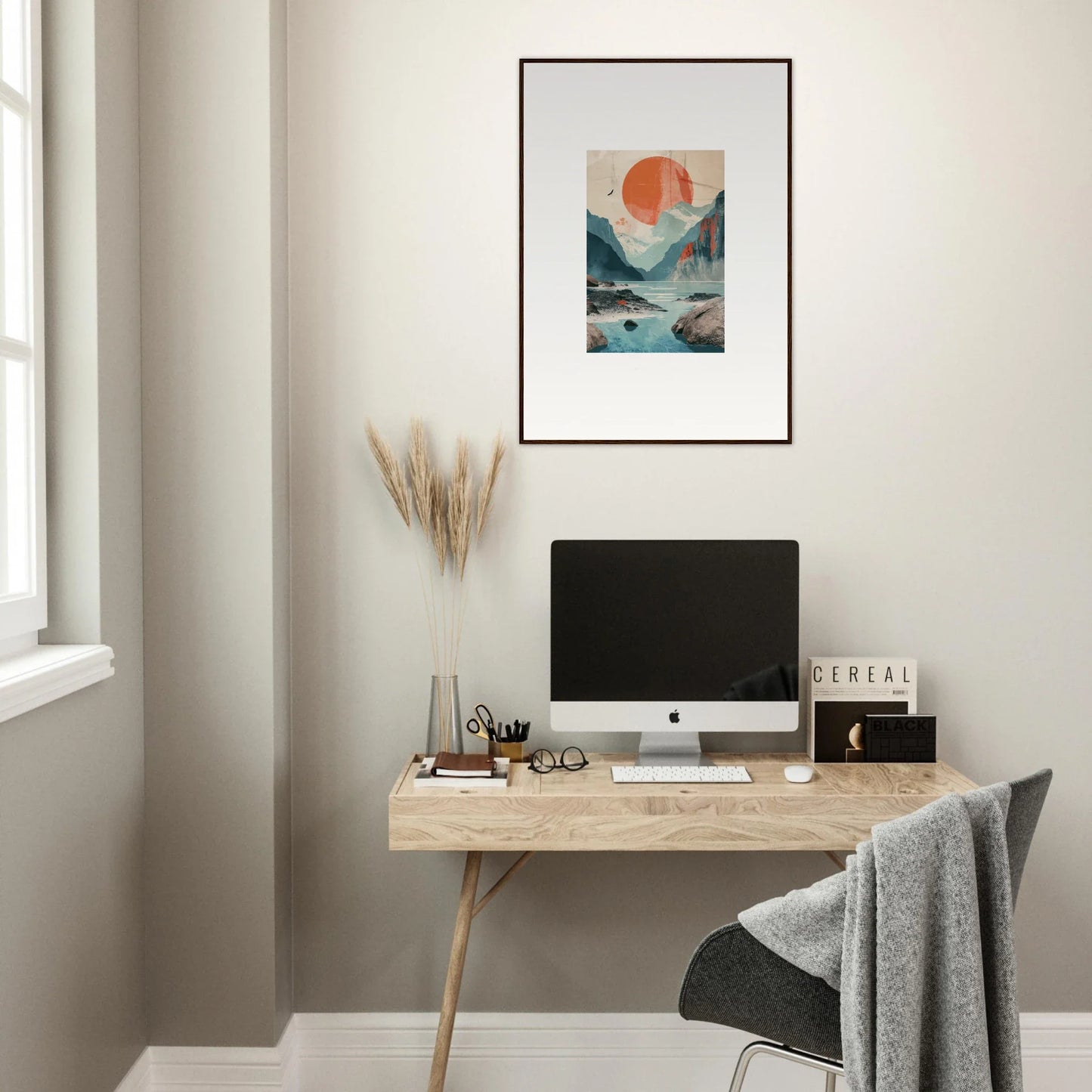 Minimalist wooden desk with computer monitor and framed wall art in Sun Echoes room decor