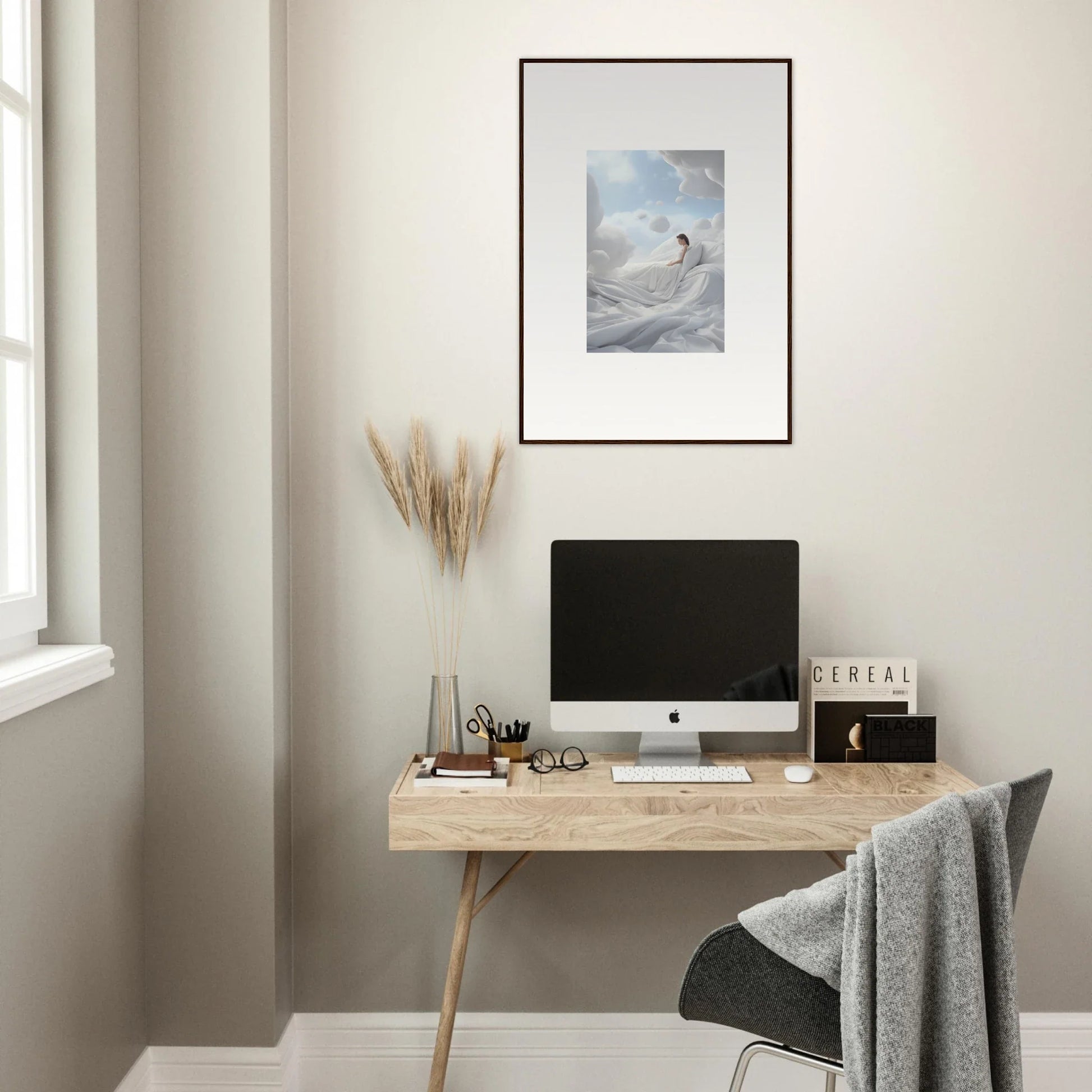 Minimalist wooden desk with computer monitor and framed wall art for cotton dream room decor