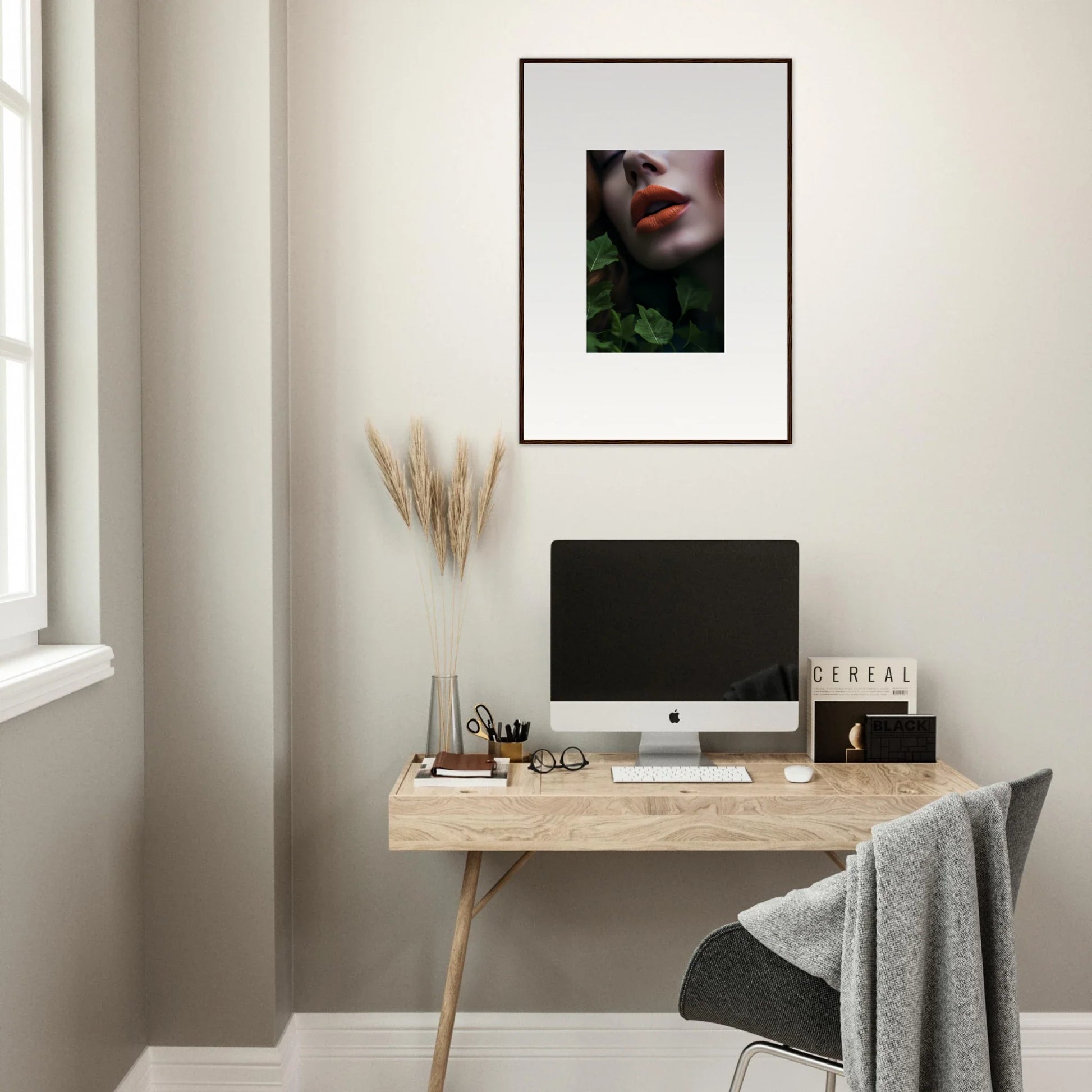 Minimalist wooden desk with computer monitor and Leaf Symphony framed wall art