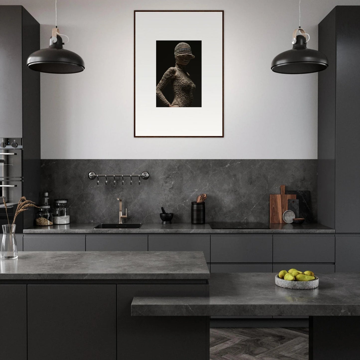 Modern, dark-toned kitchen with sleek cabinetry and a striking black-and-white photograph as a focal point.