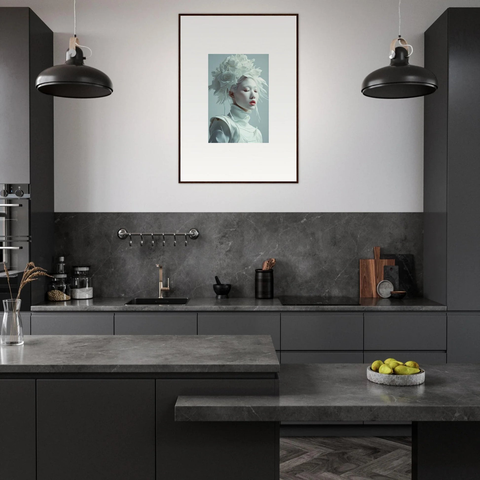 Modern kitchen featuring dark cabinetry, pendant lights, and framed wall art for room decor