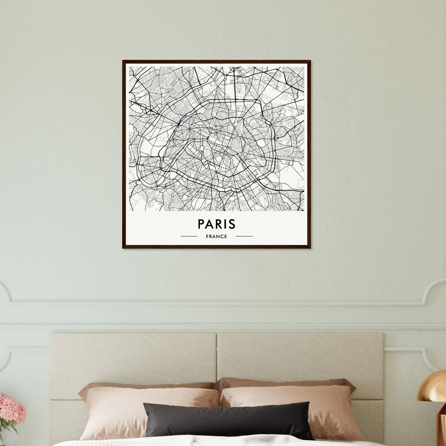 Framed map of Paris showing the city’s street layout and major landmarks.