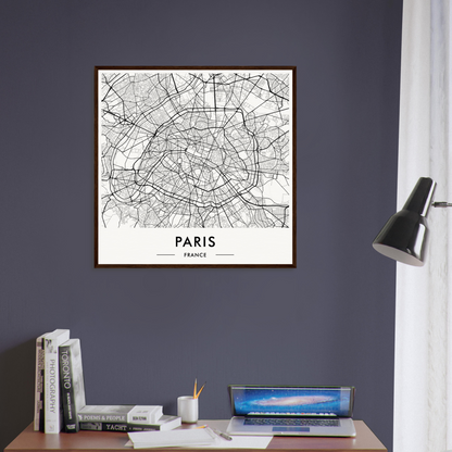 Framed map of Paris showing the city’s street layout.