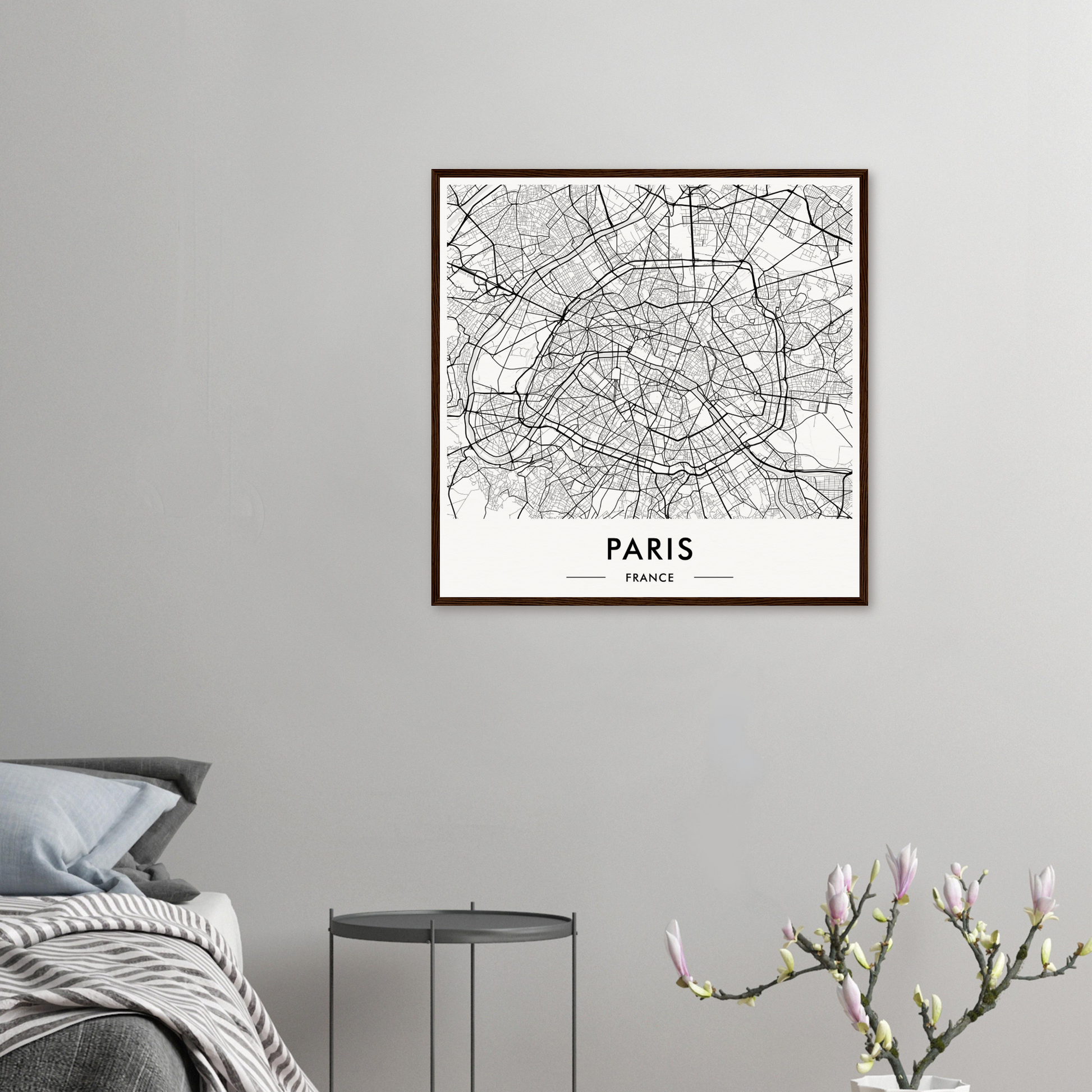 Framed map of Paris showing the city’s street layout and major landmarks.