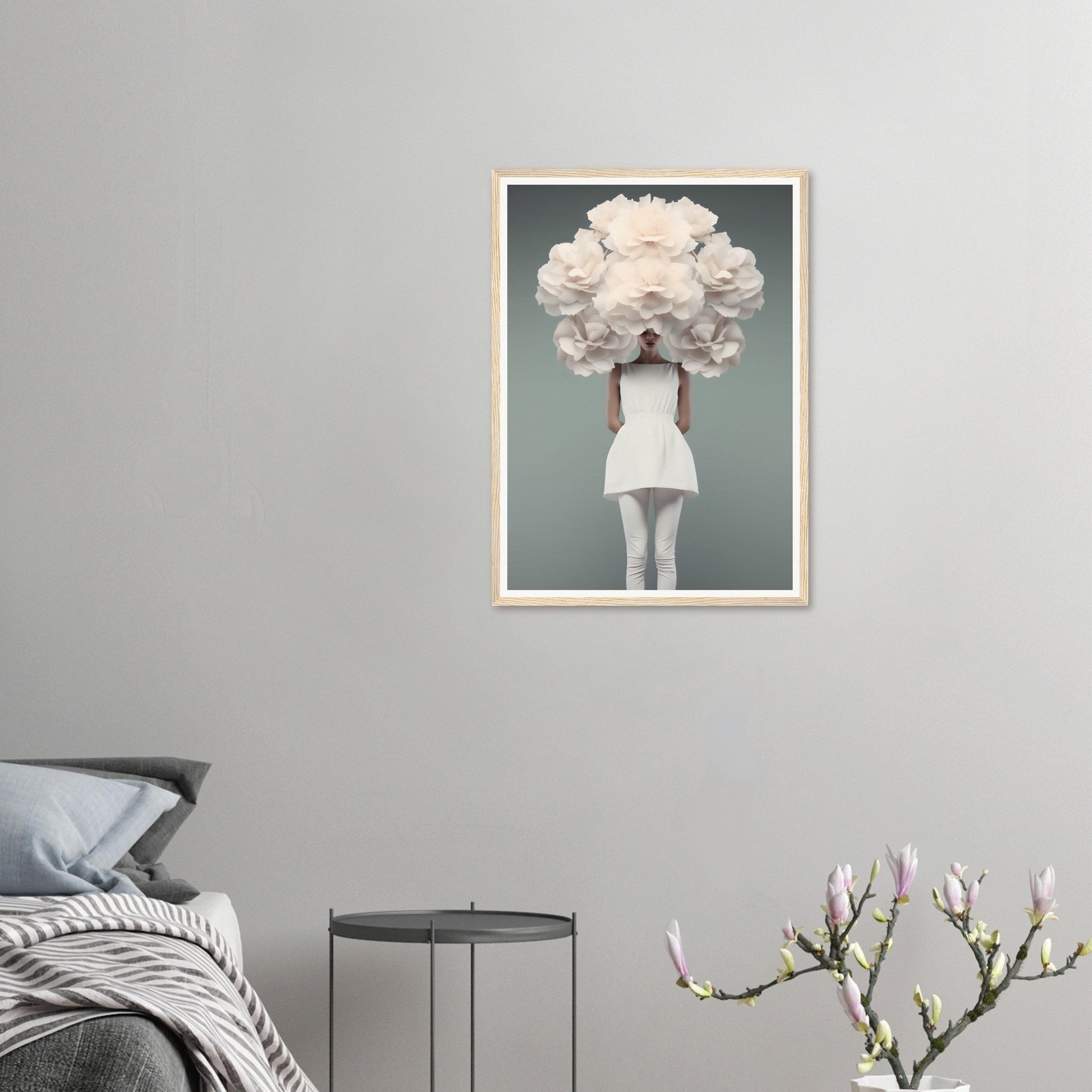 Framed artwork depicting a figure with an enormous white floral headdress obscuring their face.