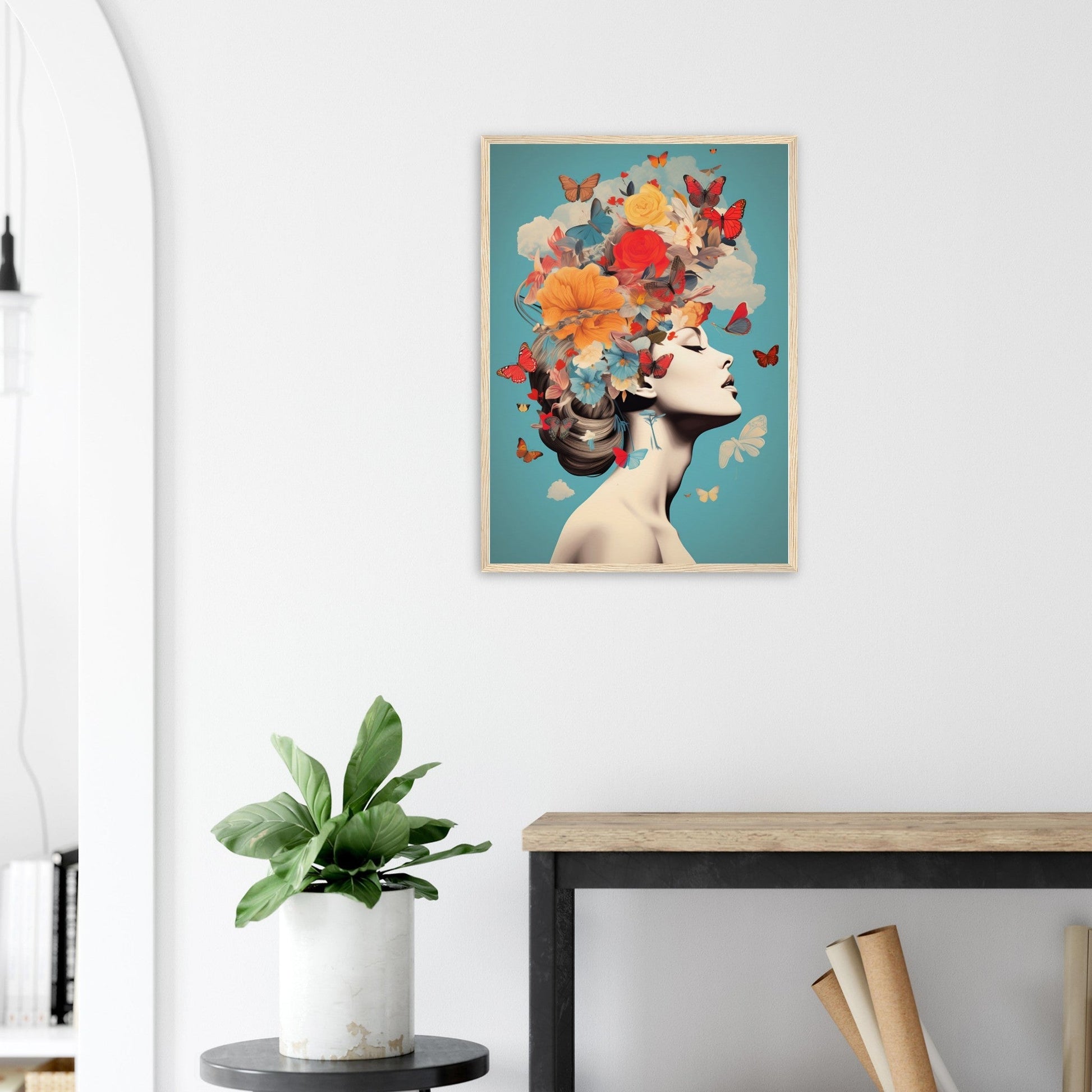 Framed artwork depicting a profile silhouette with colorful butterflies forming an elaborate hairstyle.