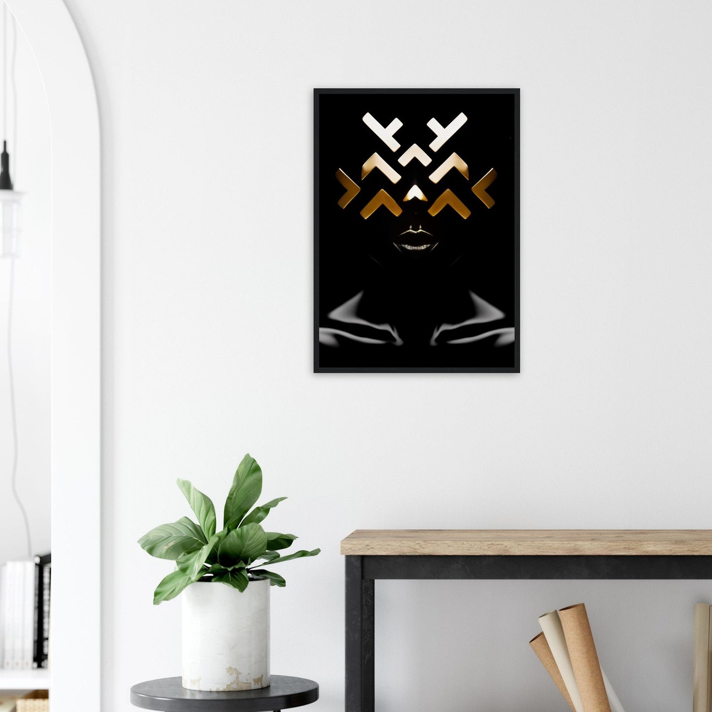 Abstract geometric artwork featuring white and gold X shapes on a black background with a stylized face-like design.