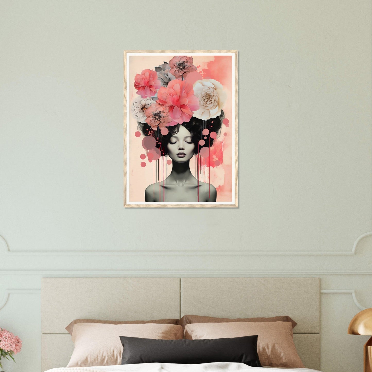 A pink and white bedroom with a large bed and a painting of a woman with flowers on her head