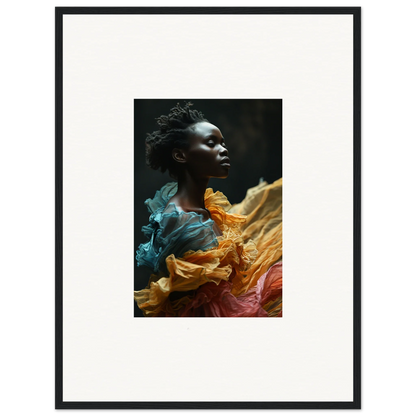 Portrait of a Black person surrounded by vibrant, flowing fabric in teal, orange, and pink hues.