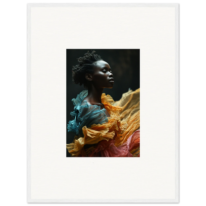 Portrait of a person with dark skin surrounded by vibrant, flowing fabric in teal, orange, and pink hues.