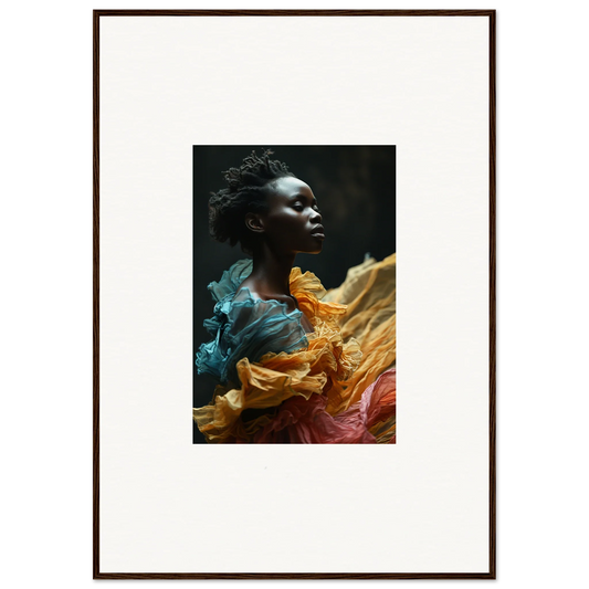 Portrait of a person with dark skin surrounded by vibrant, flowing fabric in teal, orange, and pink hues.