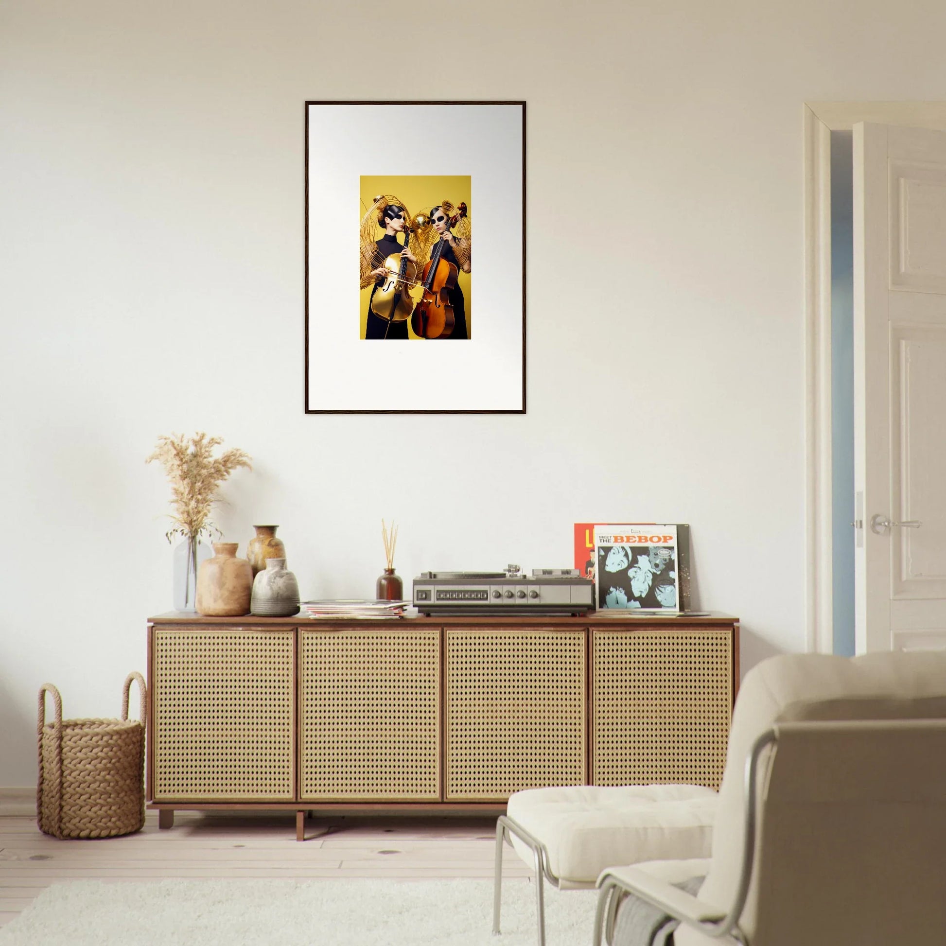 Rattan-fronted wooden sideboard with room decor and framed wall art in Dive Illusions