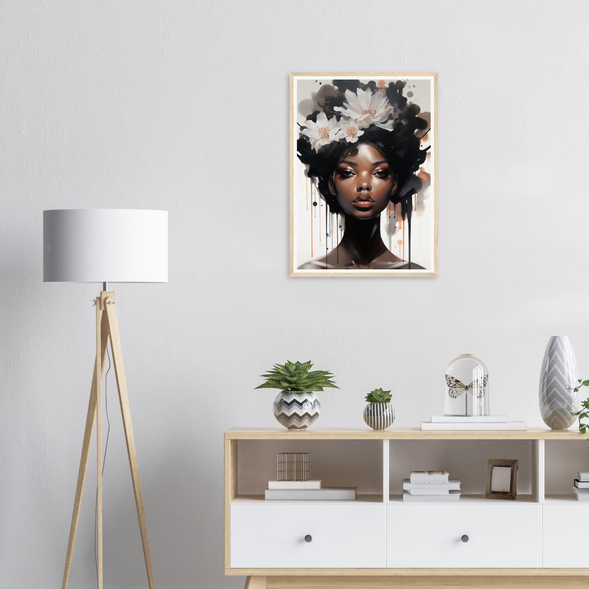 Portrait of a woman with flowers in her hair, framed and hanging on a wall.