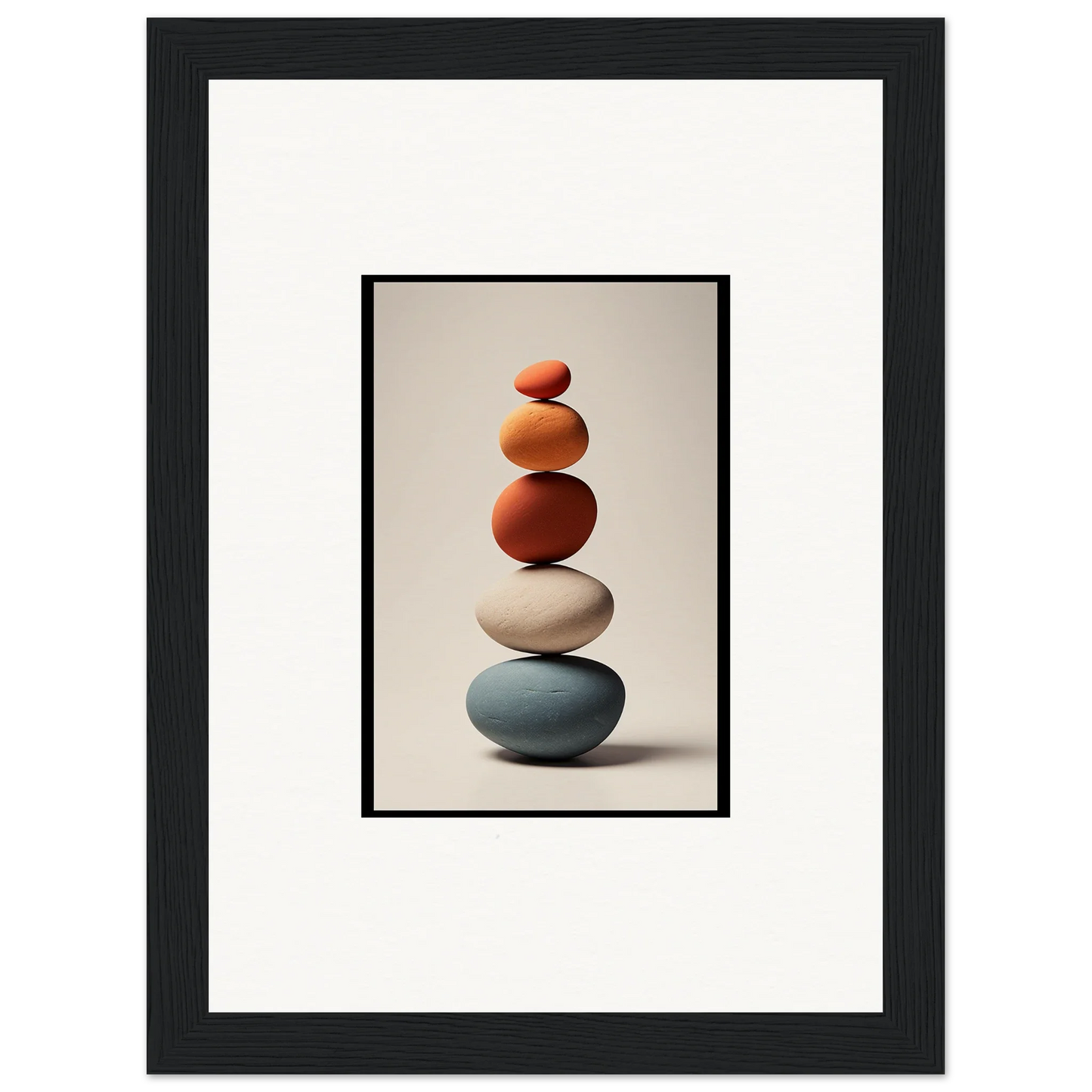 Balanced stack of five smooth stones in earthy colors for Zen Collage Poetry decor