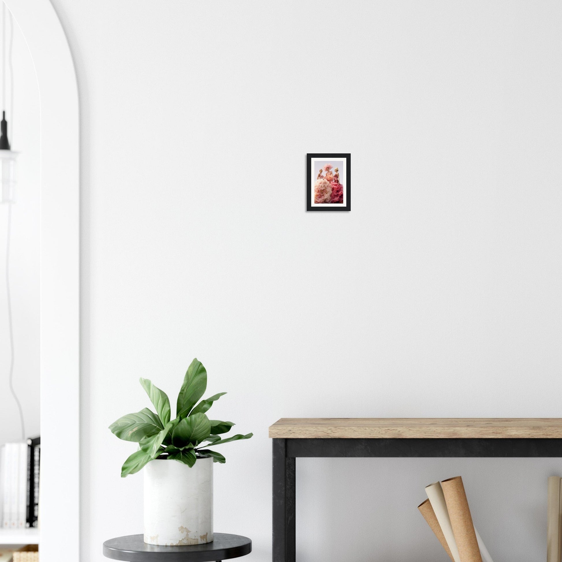 Framed photograph hanging on a white wall.